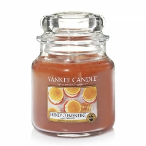 Свеча средняя в стеклянной банке "Медовый клементин" Honey Clementine 411 гр 65-90 часов YANKEE CANDLE  267988 Оранжевый