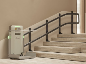 Лестничный подъемник с изогнутой направляющей