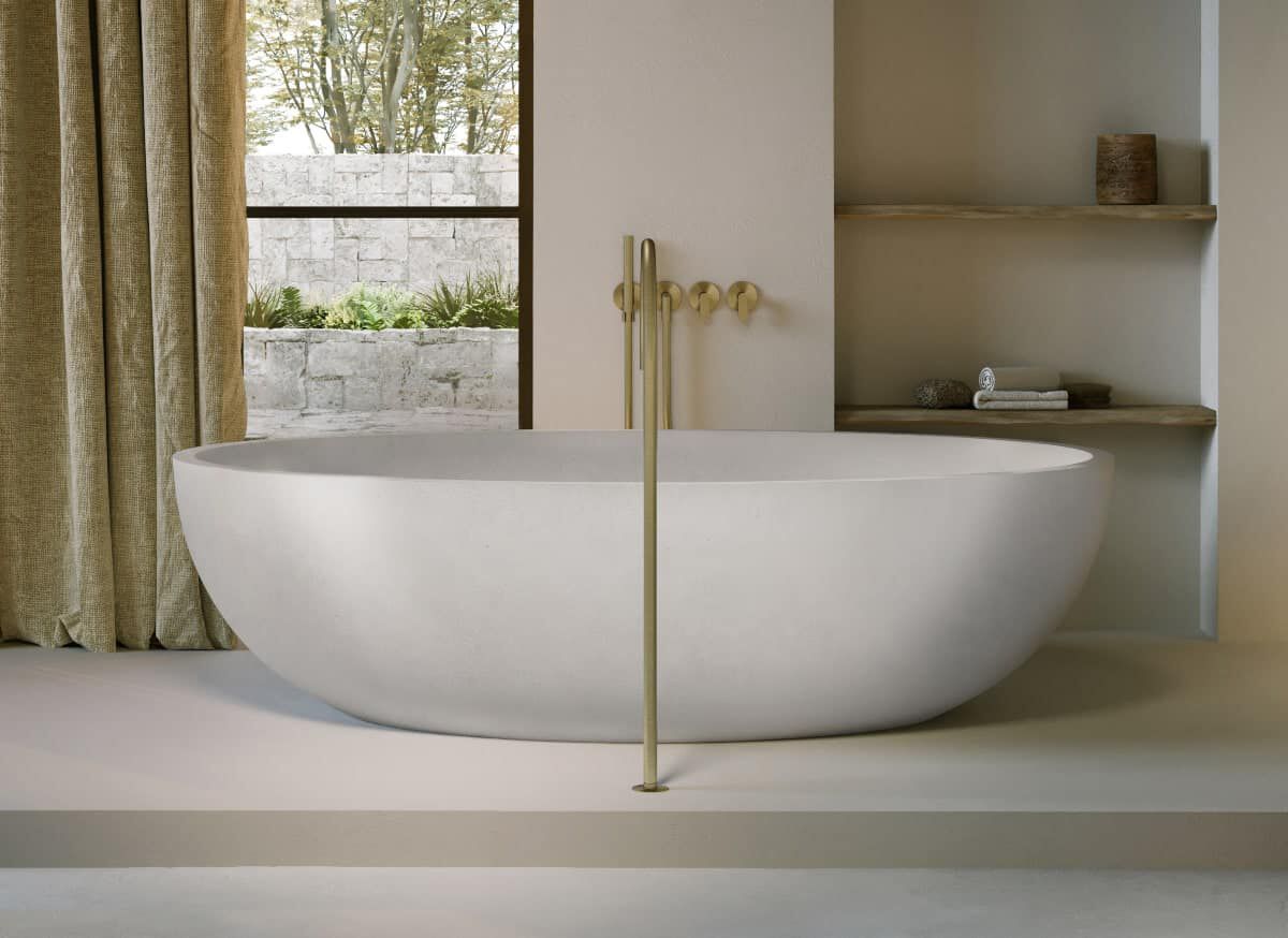 Облегченная бетонная овальная ванна в центре комнаты COCOON Maison ARCH-00025679 - Вид №1